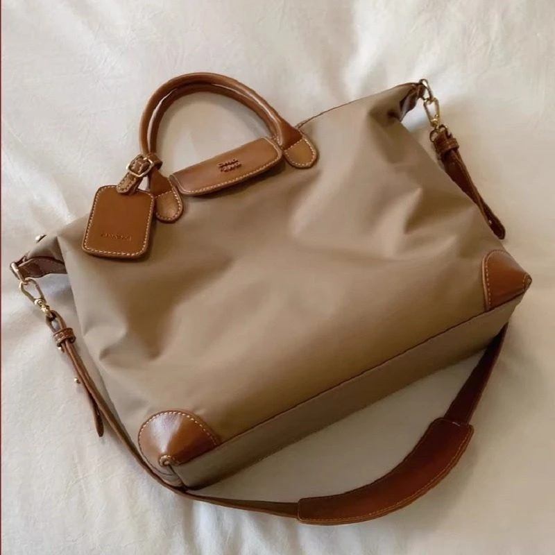 休闲手提斜挎包女包包通勤托特单肩大容量Chi旅行家南风时尚百搭