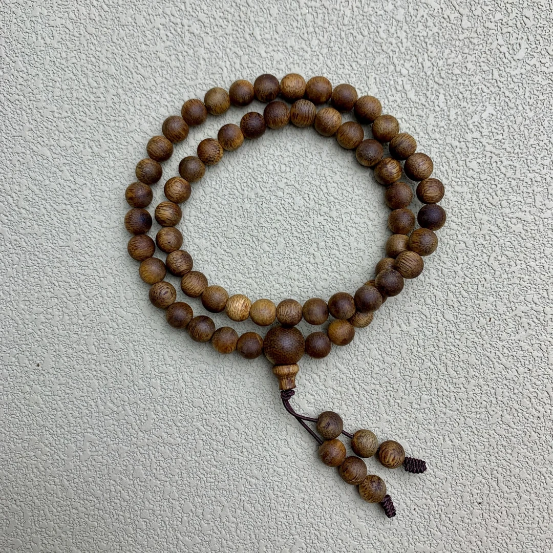 沉香海南尖峰岭莺歌绿奇楠0.6双圈【沉水浮】多样性发其一