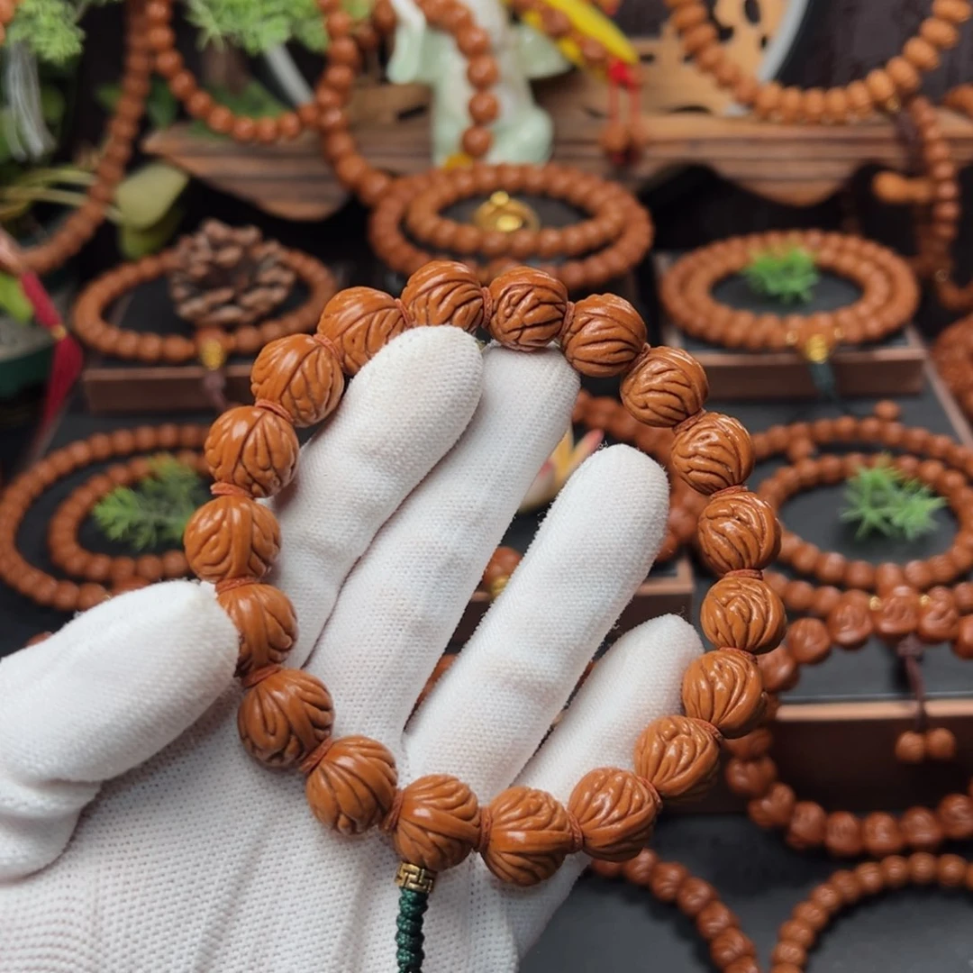 吊坠桃核1.5祥云手持