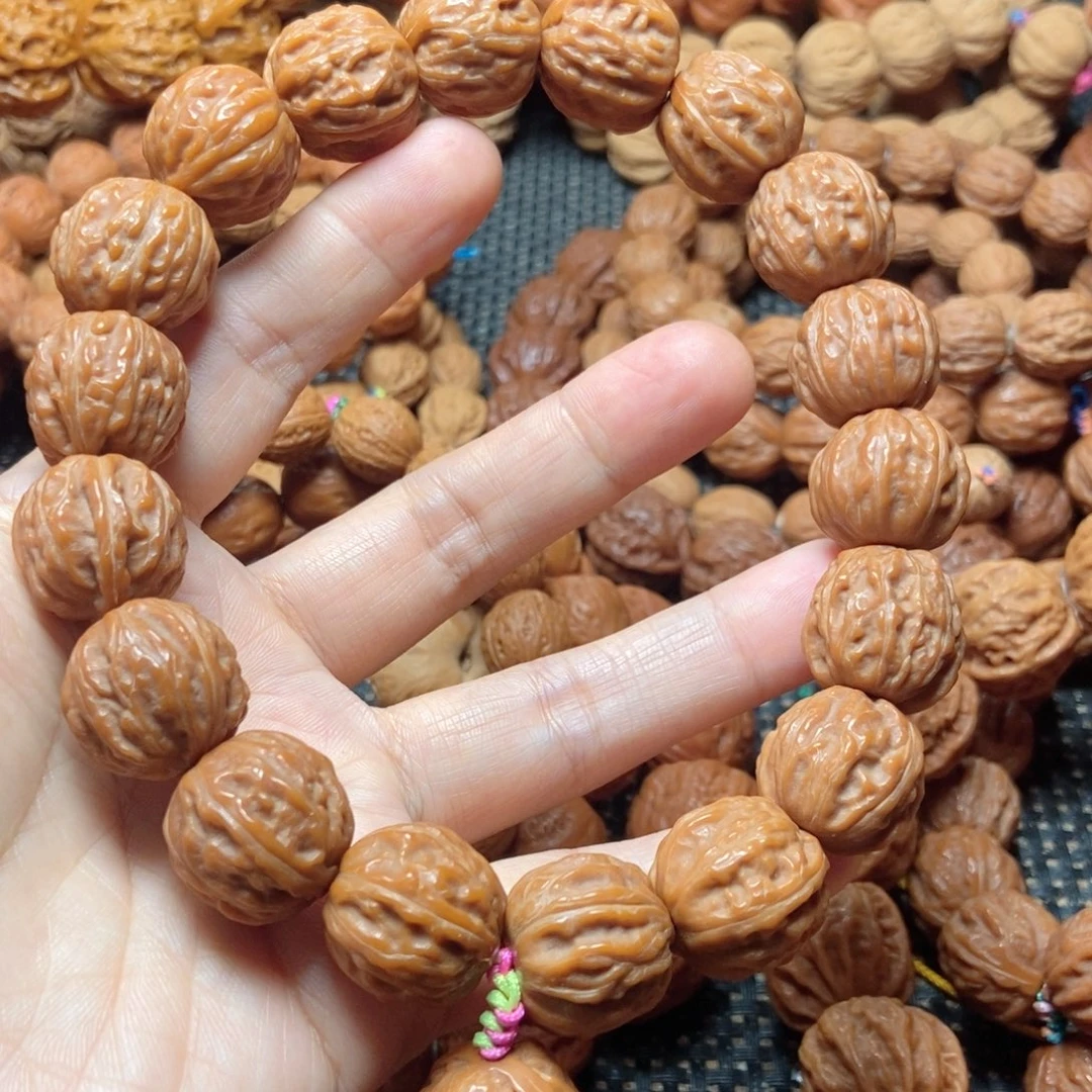 雨***洋文玩核桃手串树王手持