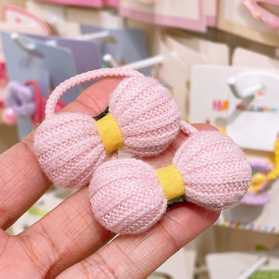 A-6205  ad 1对粉色蝴蝶结针织儿童秋冬充棉百搭头绳        发圈