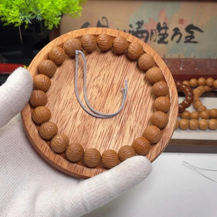 爱***悦猴头核桃手串凤羽