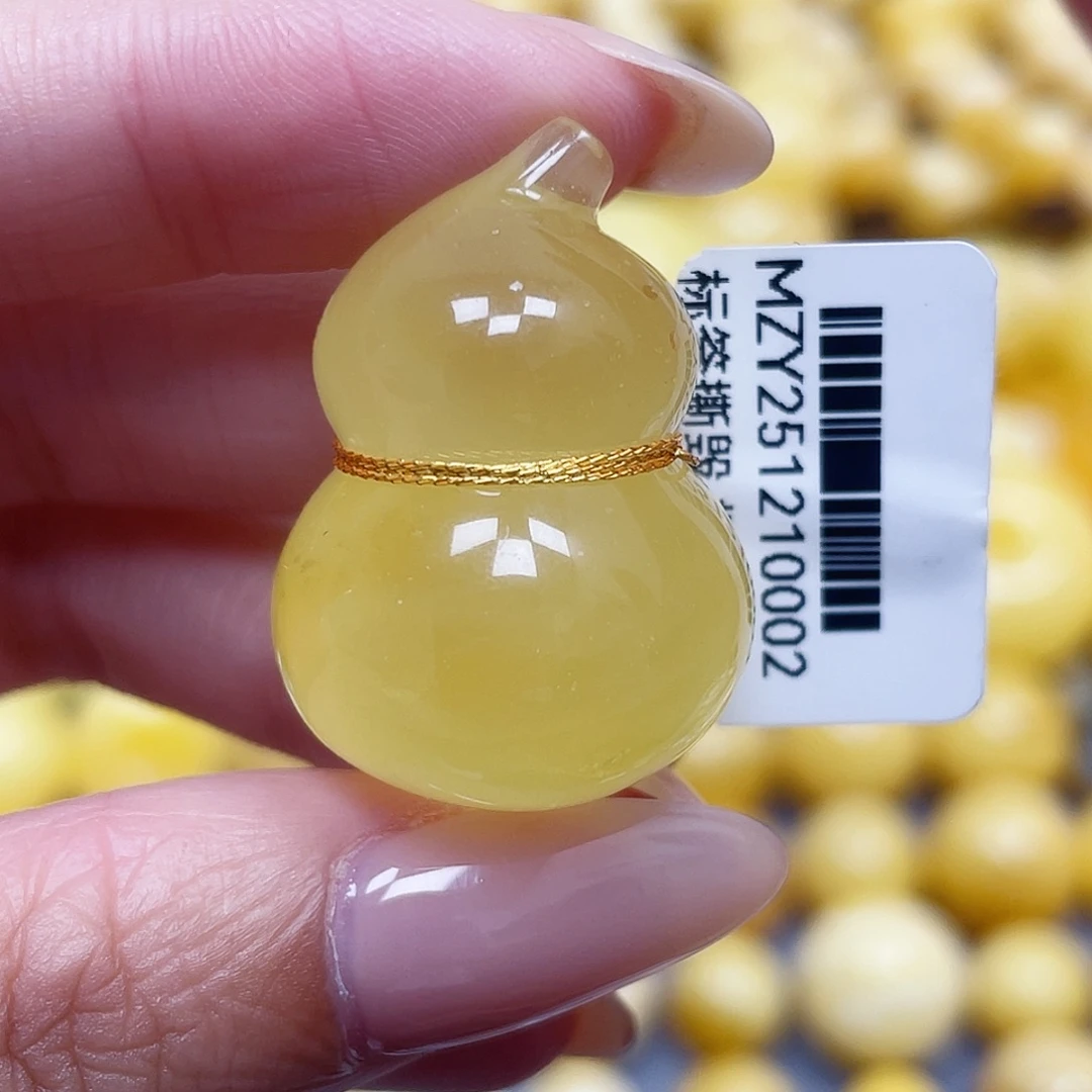 蜜蜡未镶嵌裸石31.5*22.6*17.5mm瑕疵 福利价