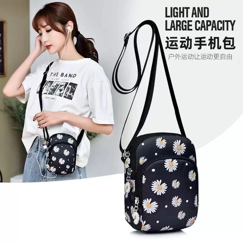 小雛菊三層軽軽小包オックスフォード布防水女斜め掛け百合ミニ携帯多層夏帆布