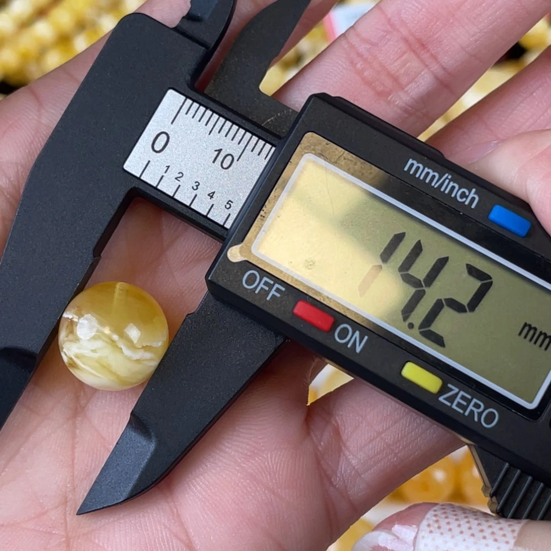 蜜蜡裸石未镶嵌单珠直径14mm+（微瑕）