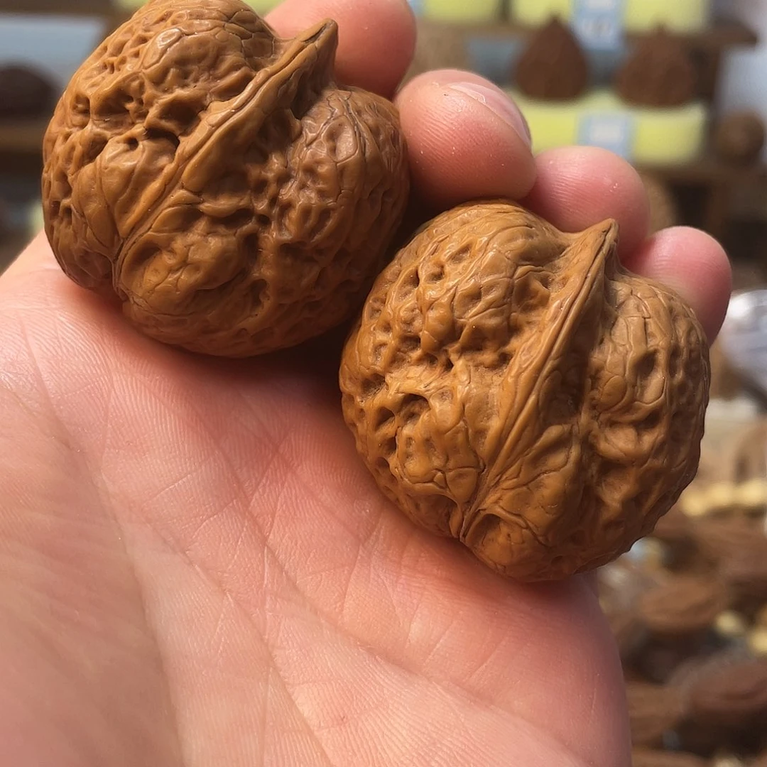 文玩核桃把件铁头陀元宝