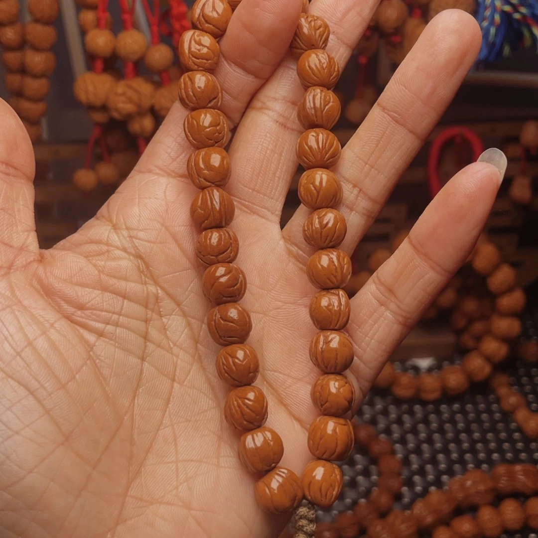 呢***。木质类龙纹桃枭挂件