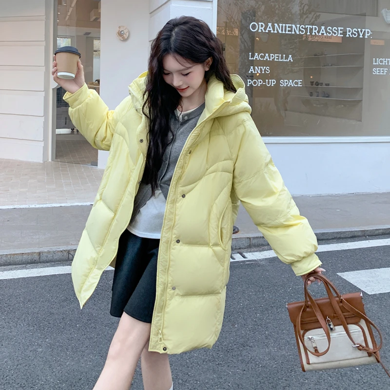 2025鹅黄加肥加大码200斤胖mm羽绒服女白鸭绒长款连帽休闲宽松