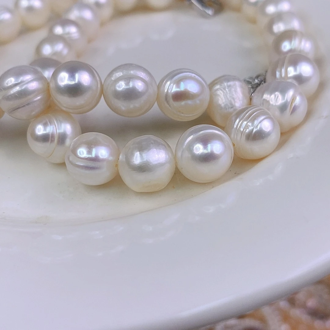 淡水珍珠手绳合金老**王