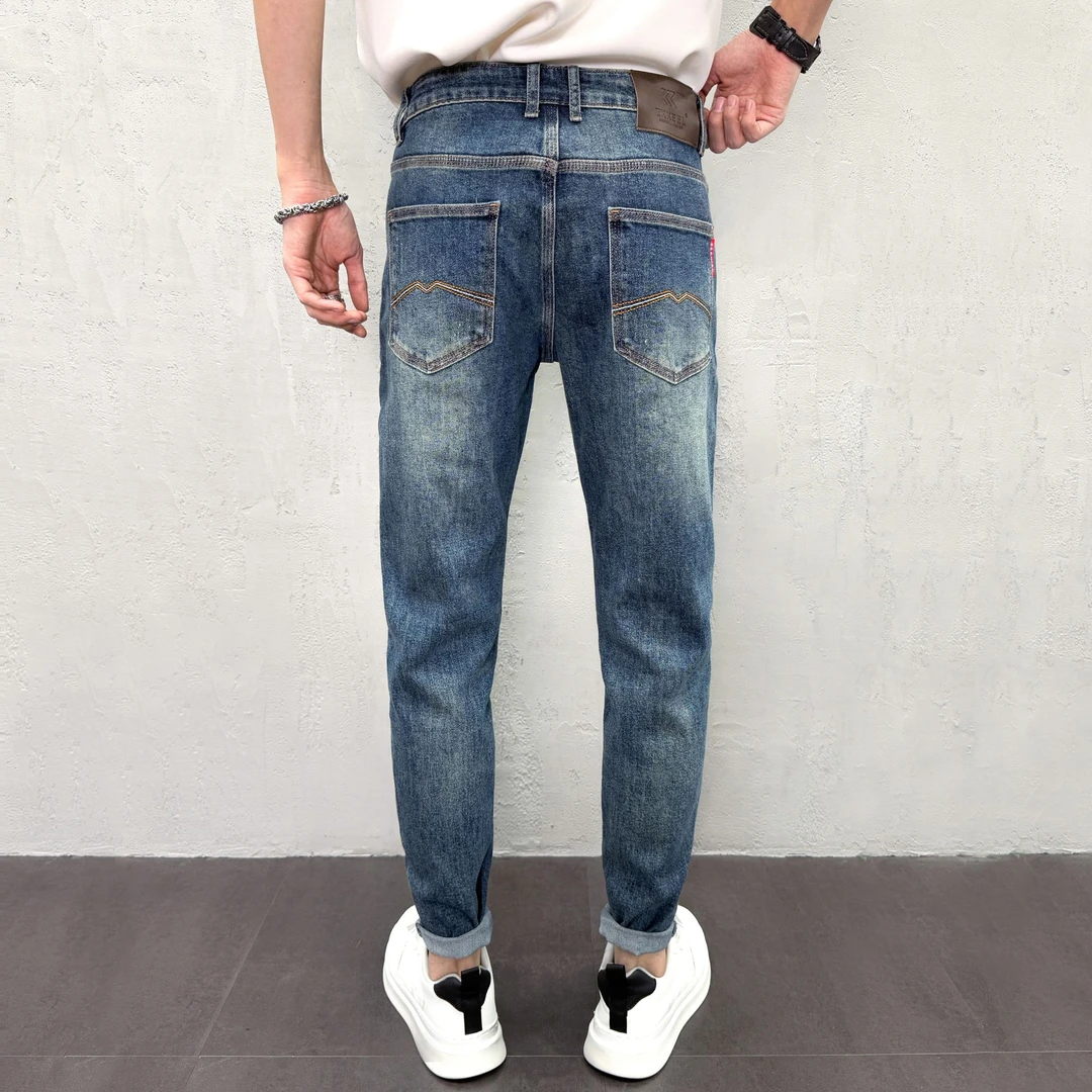 男款秋冬装弹力牛仔裤2025新款简约休闲蓝色刺绣男士修身小脚长裤