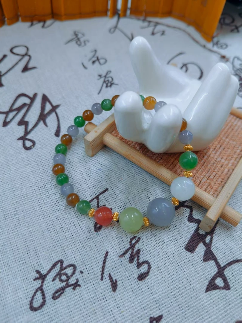 （一哥专属）HTSJ-3005和田玉手串约6MM多样性发其一