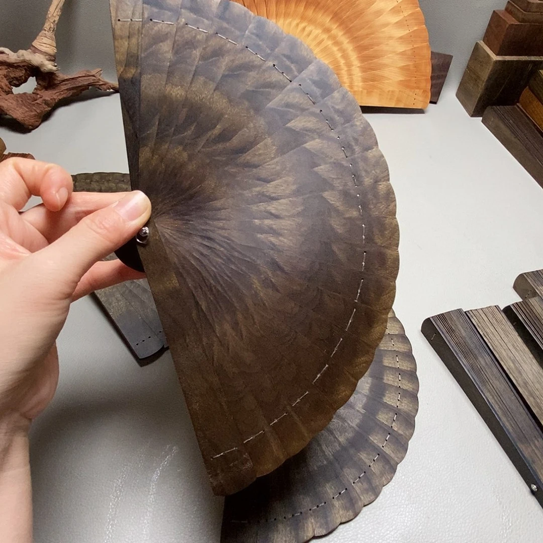 楠木金*妮金丝楠木15折扇阴沉