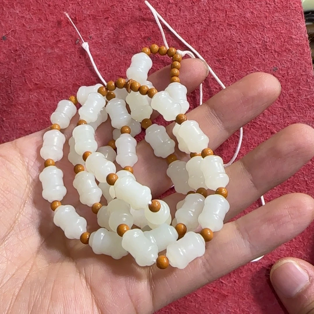 和田玉未镶嵌挂件叫**周