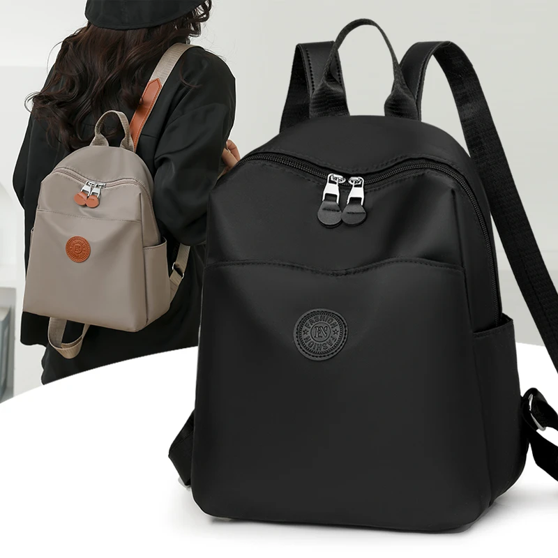 双肩包牛津布轻便背包2025大容量新款通勤时尚百搭休闲书包