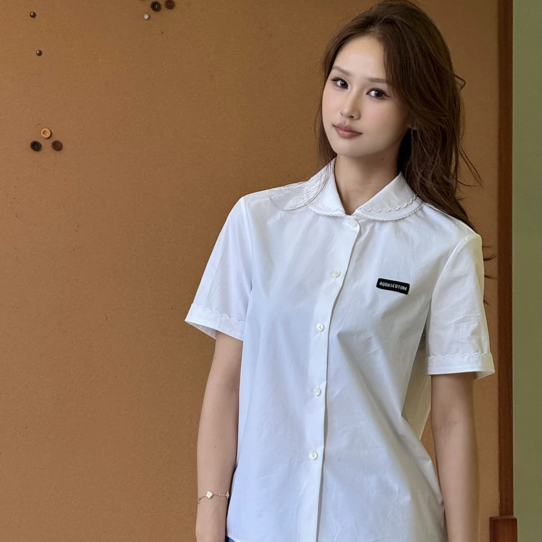 Aquascutum/雅格狮丹2025秋冬新品女休闲百搭蕾丝边立领衬衫