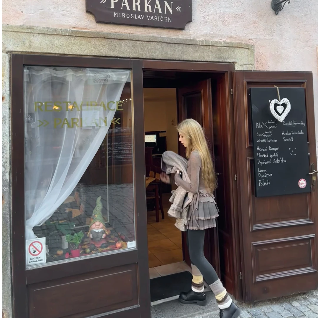 ishui-玛德琳-双层摆美拉德风显瘦显气质皮质棕色蝴蝶结百褶裙