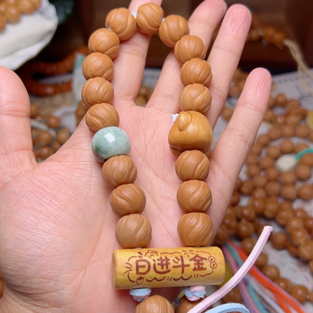 。***。吊坠猴头核桃卷卷酥