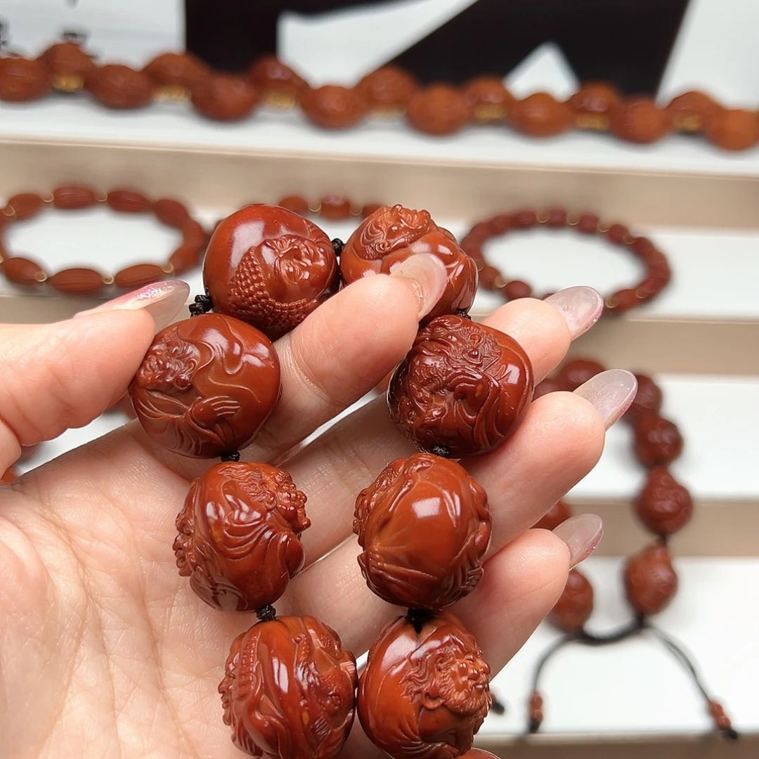 聚***式橄榄核手串十八罗汉