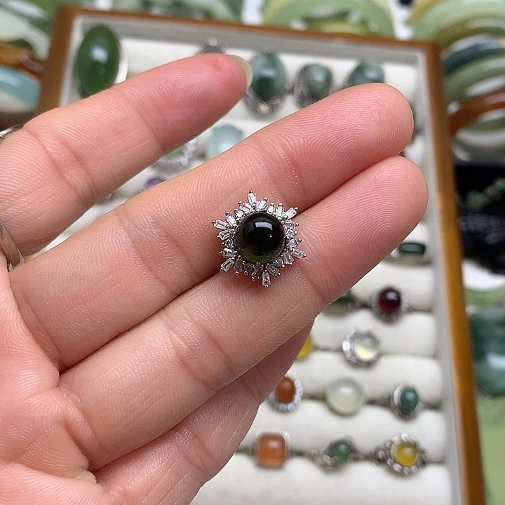 靖***长蛇纹石玉银S925镶嵌耳环