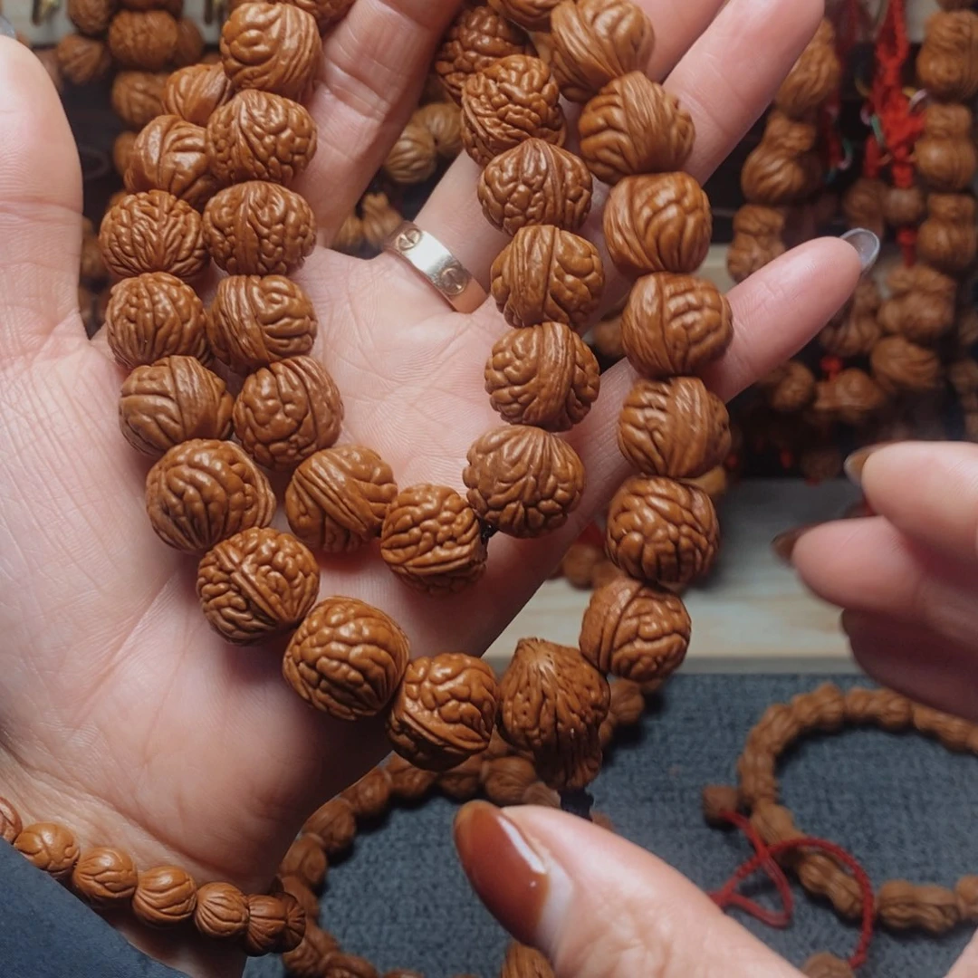 净***境桃核吊坠龙纹桃枭