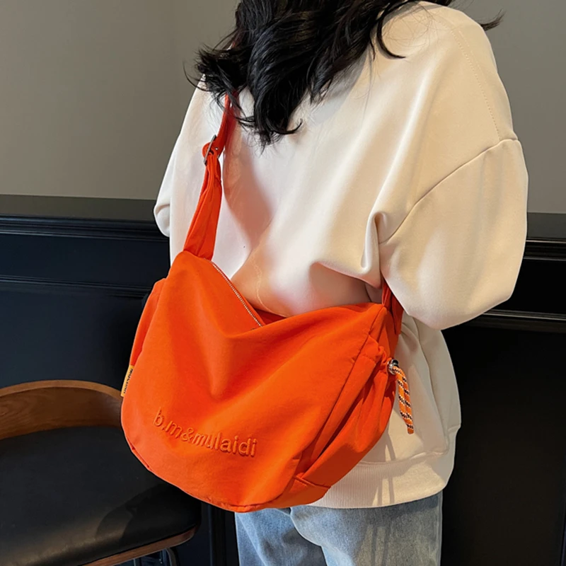 大容量包包女春夏百搭2025新款帆布单肩斜挎包大学生上课包饺子包
