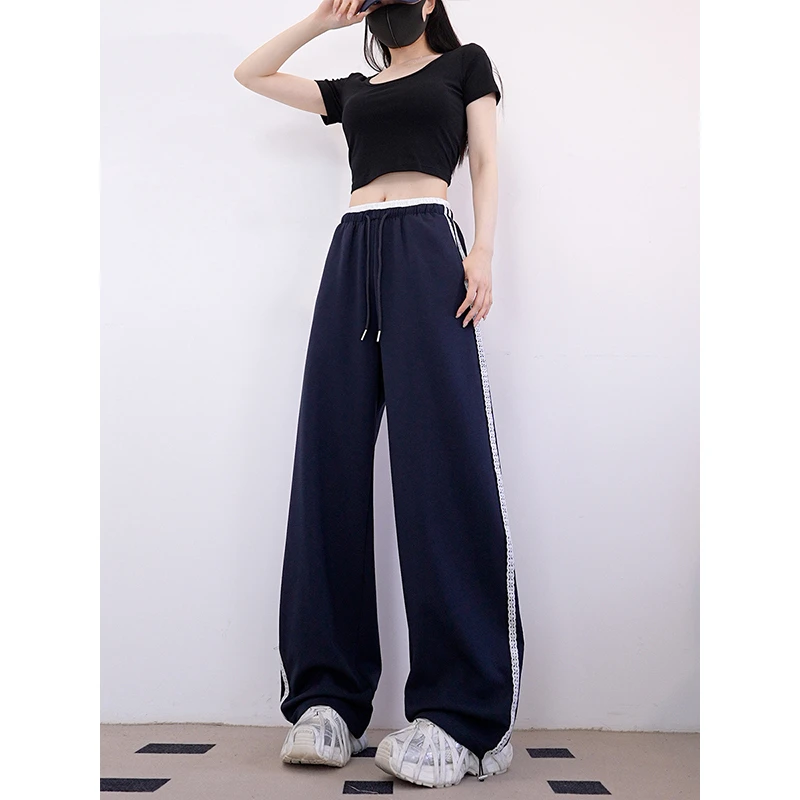 2025春夏洋气衣服小众女装蕾丝穿搭设计感宽松显瘦松紧腰弯刀裤子