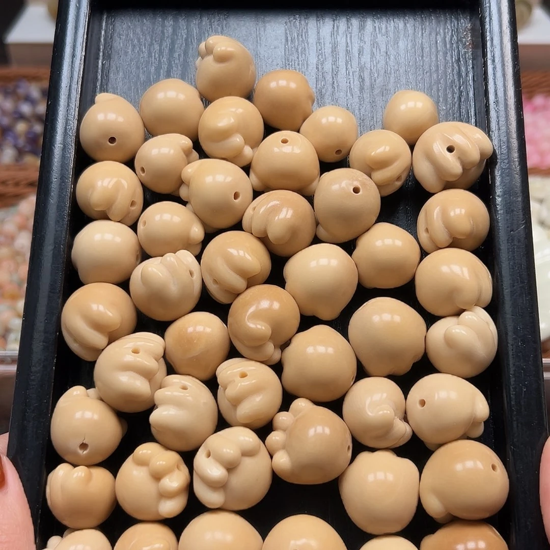 手串菩提根/象牙果瑕疵奶茶爪子4颗