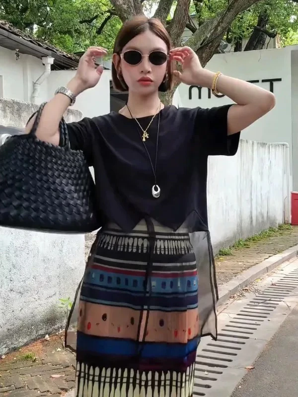 (韩傢)设计感拼接有袖子上衣1989