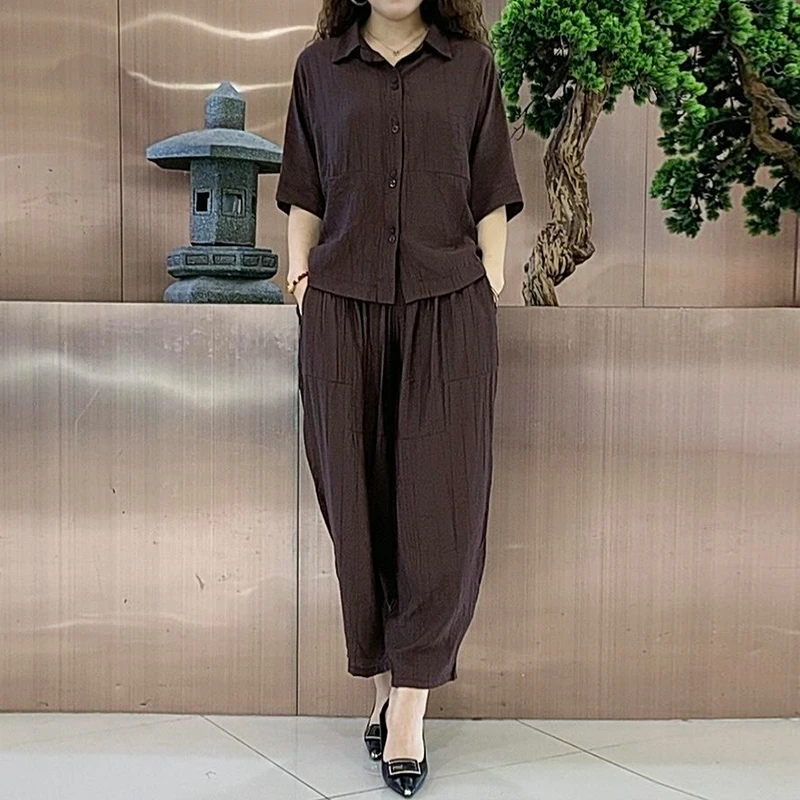 设计感纽扣拼接短袖套装女2025年夏季新款韩版时髦宽松显瘦两件套