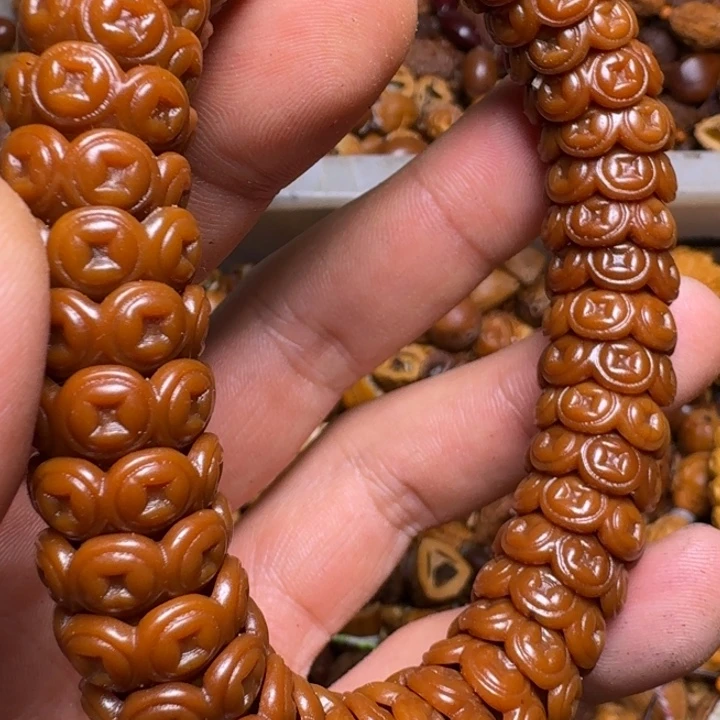 把件橄榄核你的电话