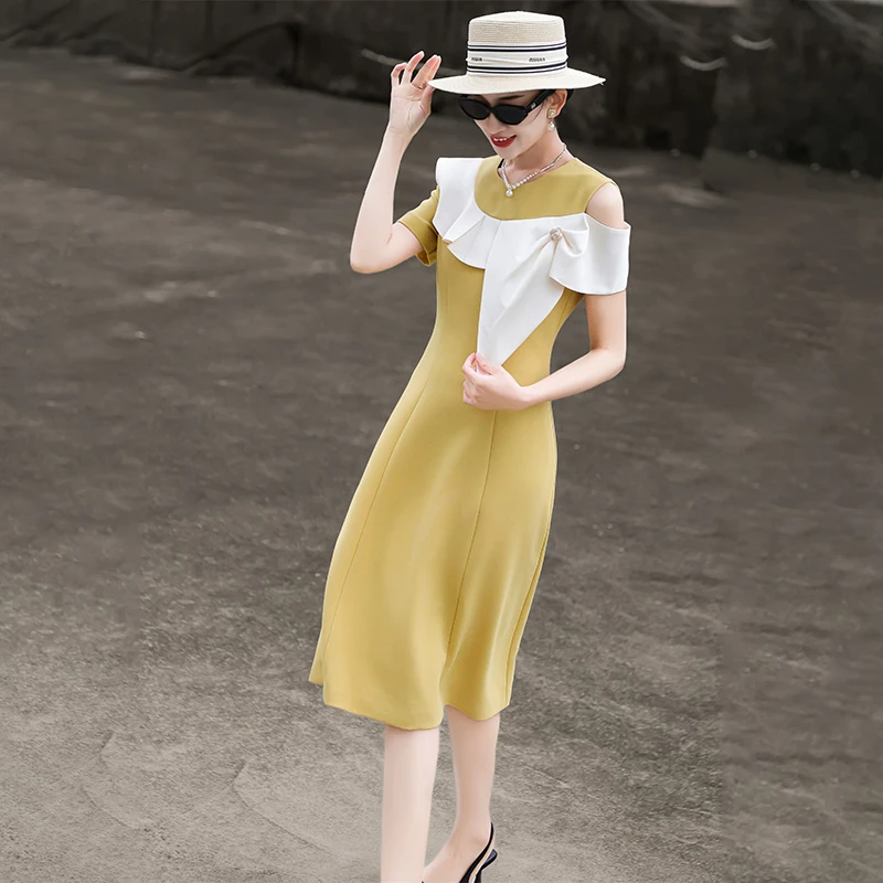 MEXCOCO/兰瑟儿夏季新款气质法式显瘦荷叶边拼接连衣裙105XL2557