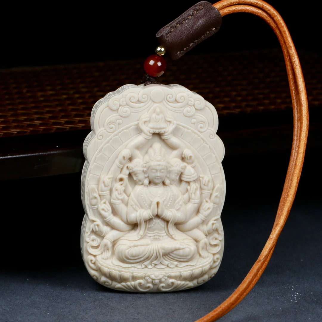 H4785天然猛犸牙 千手观音雕刻牌子48×70×19mm74克