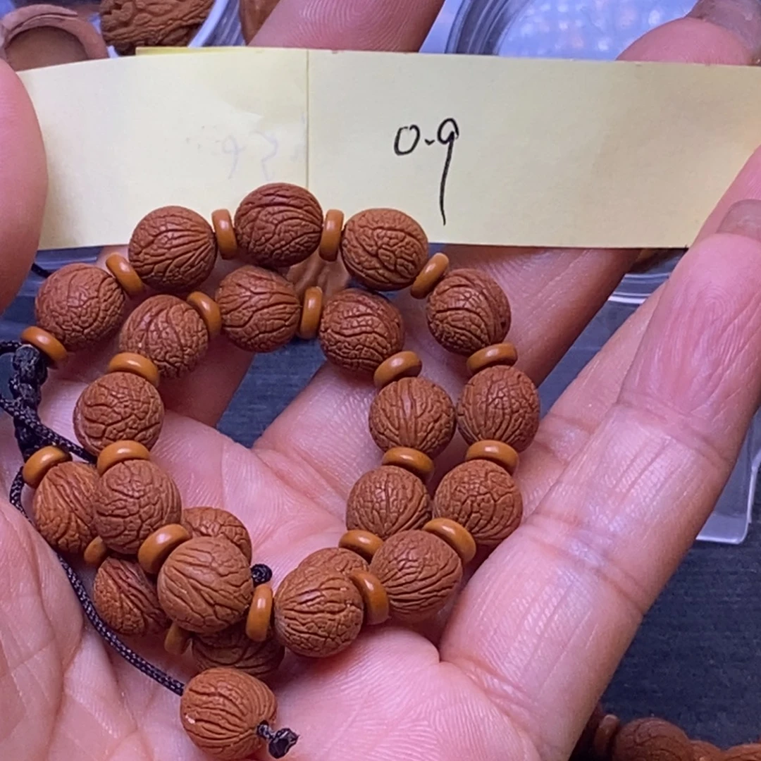 尊***发秦岭龙纹桃核36颗