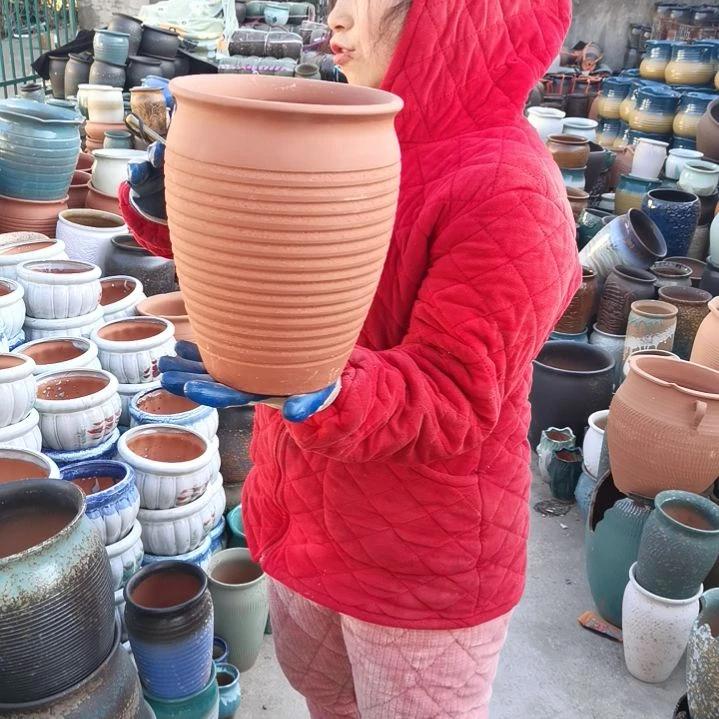 红陶口20高27瑕疵底裂