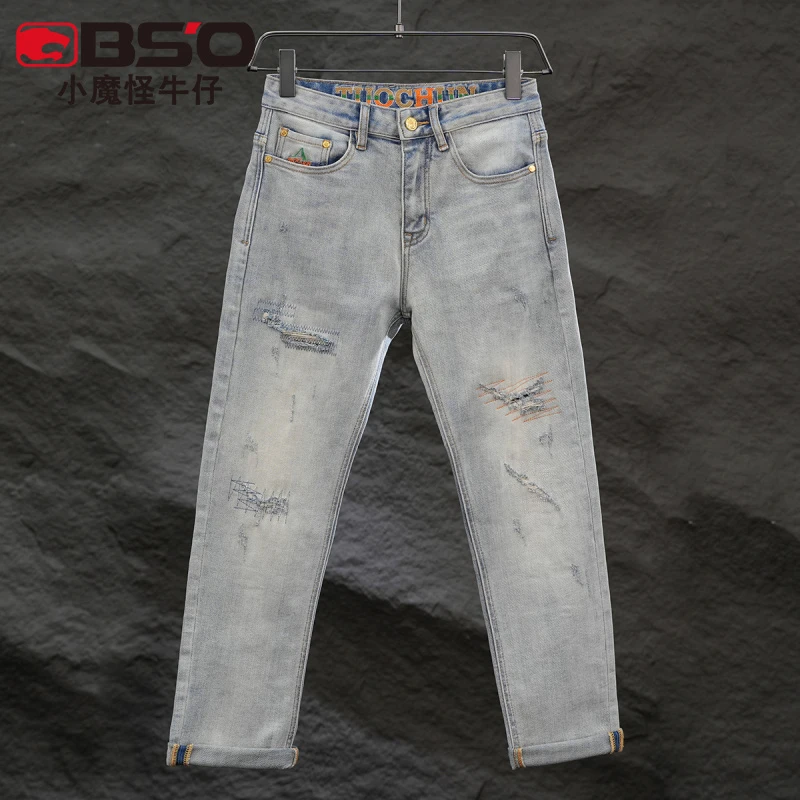 小魔怪秋冬款破洞补丁牛仔裤男款潮牌修身小直筒刺绣白玉蓝长裤子
