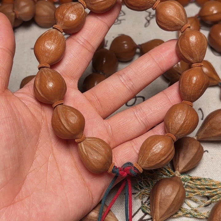橄榄核手串/手链蜜桃臀带象牙果