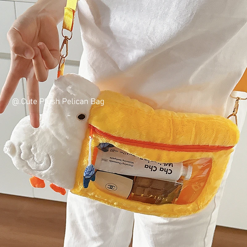 可爱鹈鹕毛绒斜挎包女2025新款卡通零钱包学生娃包痛包ccd收纳包