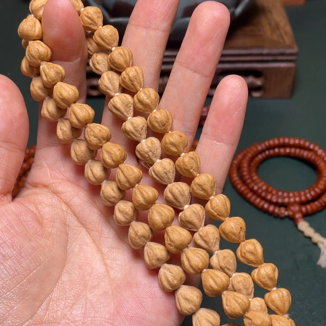 吊坠柏香籽/百香籽绝世莲花手持