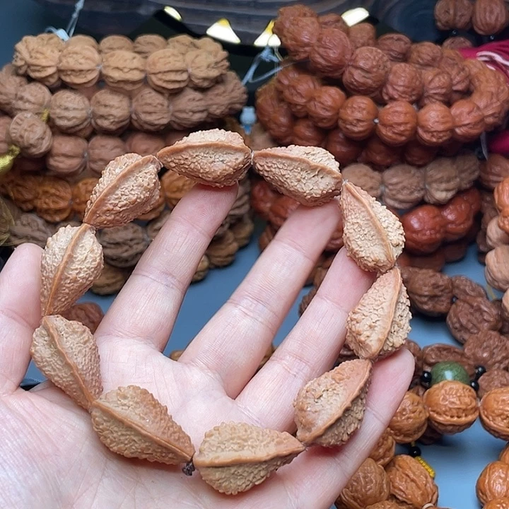 胡***北文玩核桃手串龙鳞麒麟角