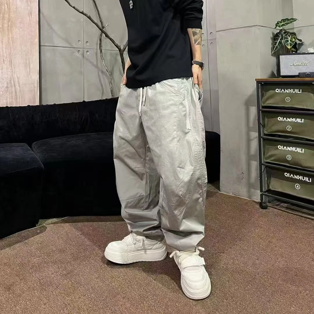 男士秋季欧版高街弯刀多口袋拼接线条抽绳阔腿宽松休闲长裤