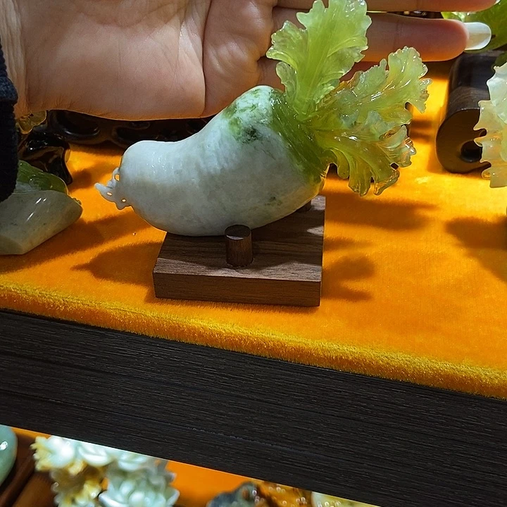 蛇纹石玉手把件合金东****?