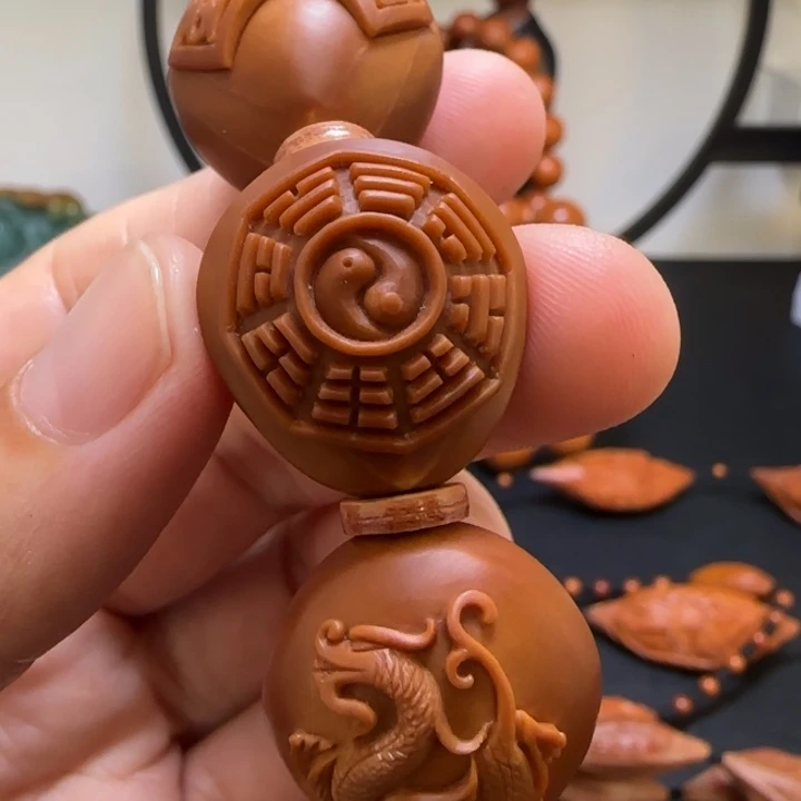 顺***为橄榄核手串/手链四象八卦2.1