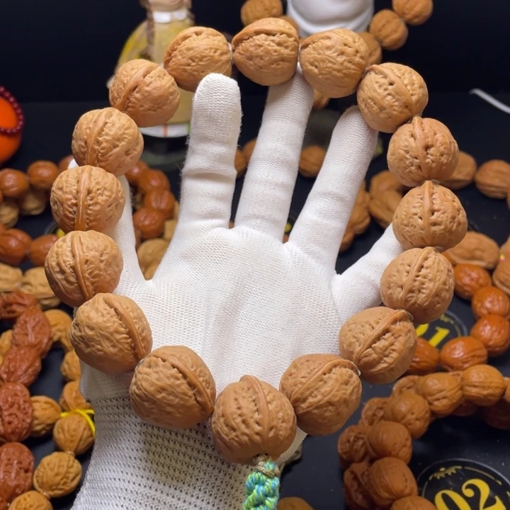 刘***耒手串文玩核桃光头