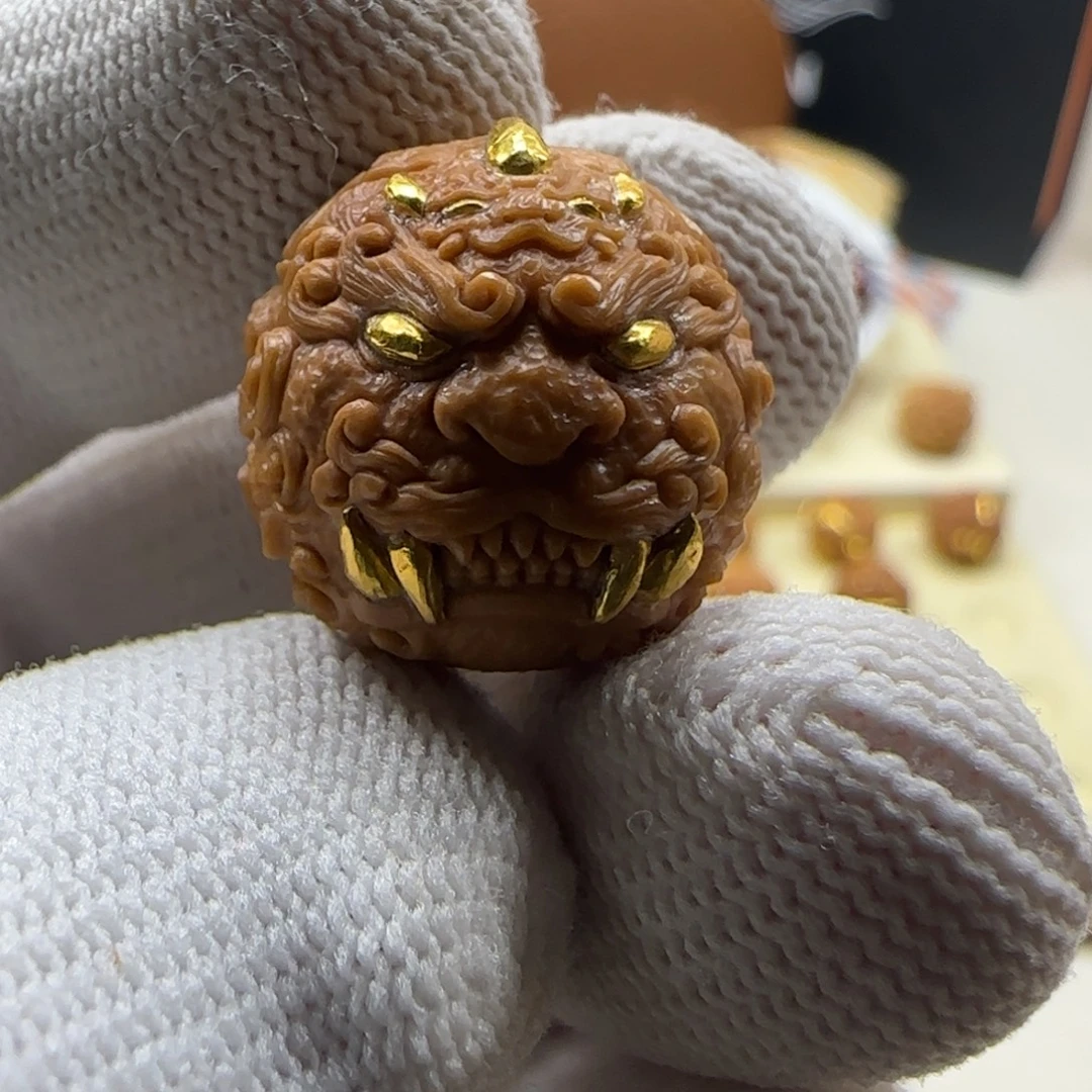 w***.吊坠猴头核桃三面唐狮镶嵌24k