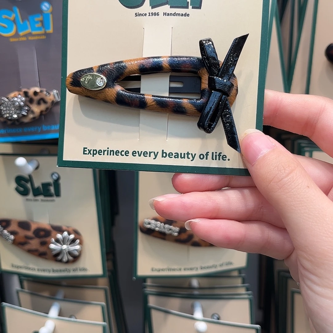 铁合金布艺豹纹皮面蝴蝶结拜拜