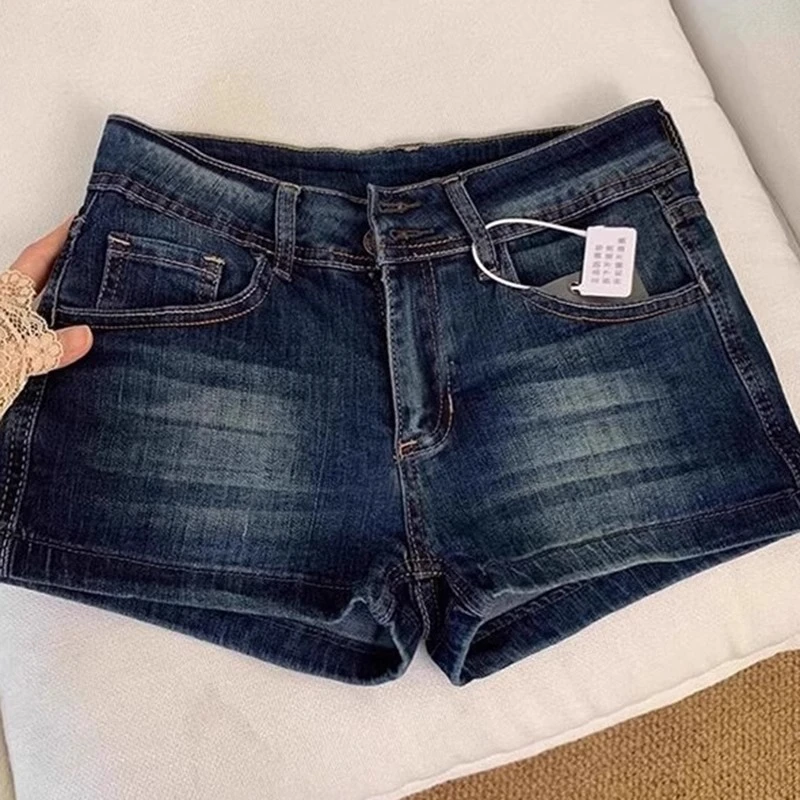 深蓝色辣妹低腰牛仔短裤女夏季2025新款修身显瘦弹力提臀a字热裤