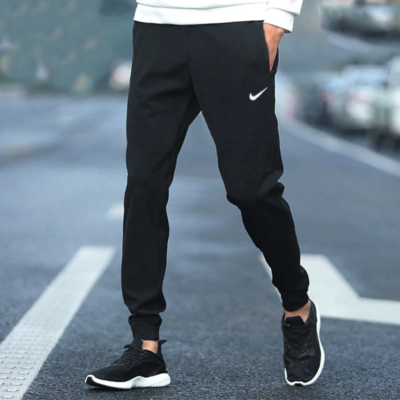 NIKE耐克男卫裤2025新款收口小脚裤针织加绒运动裤黑色长裤DQ5406