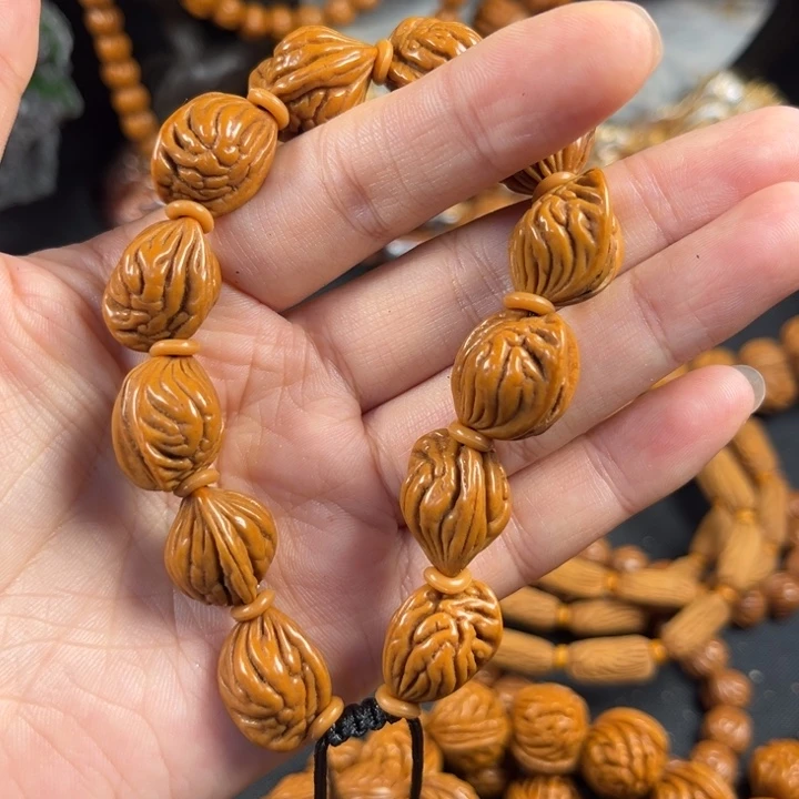 一***毛吊坠桃核生命之源