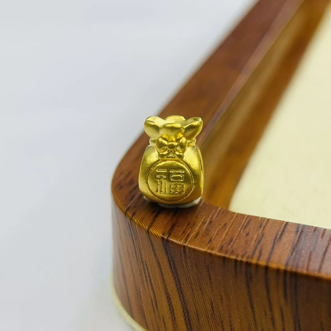 金祥顺黄金足金999光面蝴蝶结福袋小DP1671