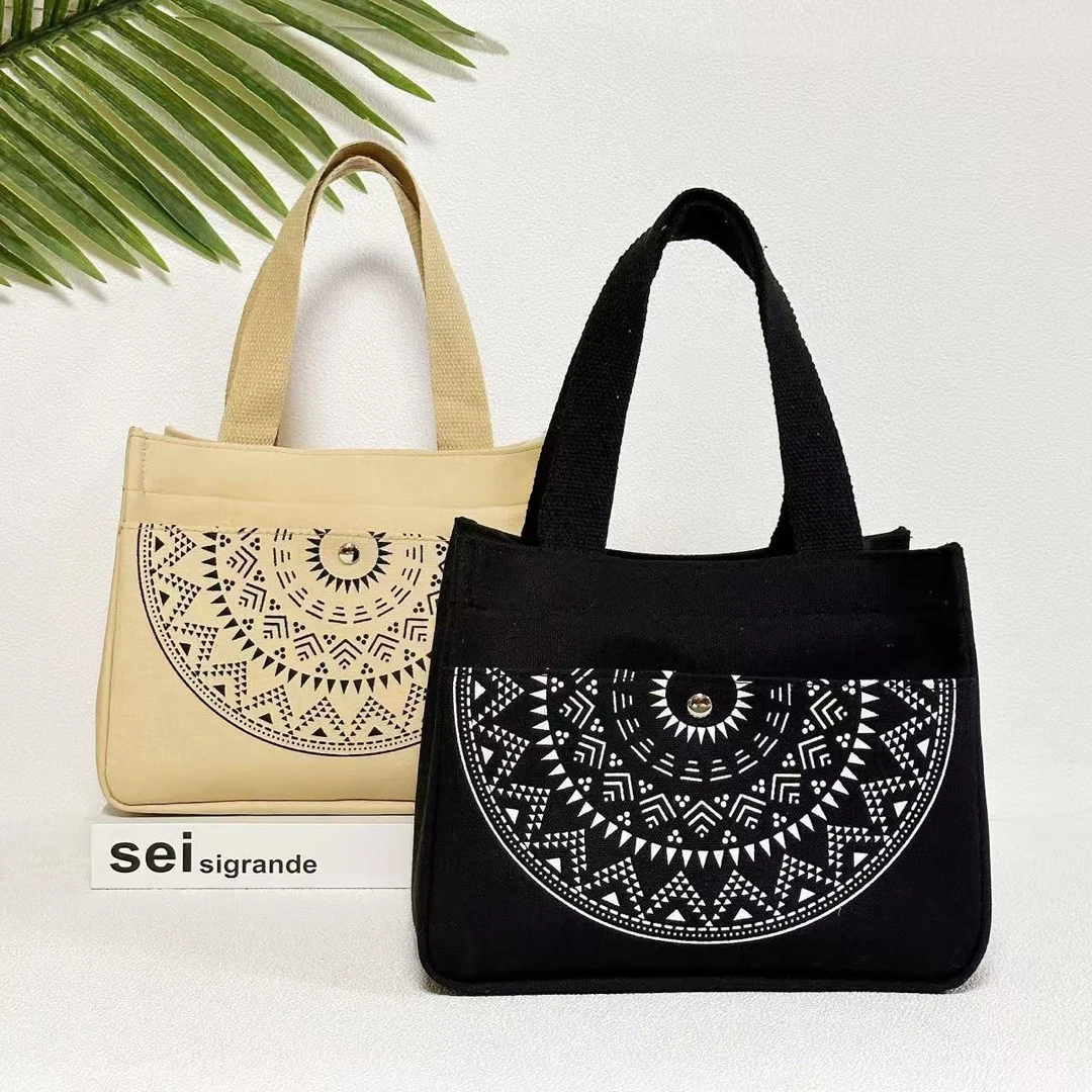 高品质民族风手提包加厚帆布女包大容量便携妈咪包学生手提饭盒包